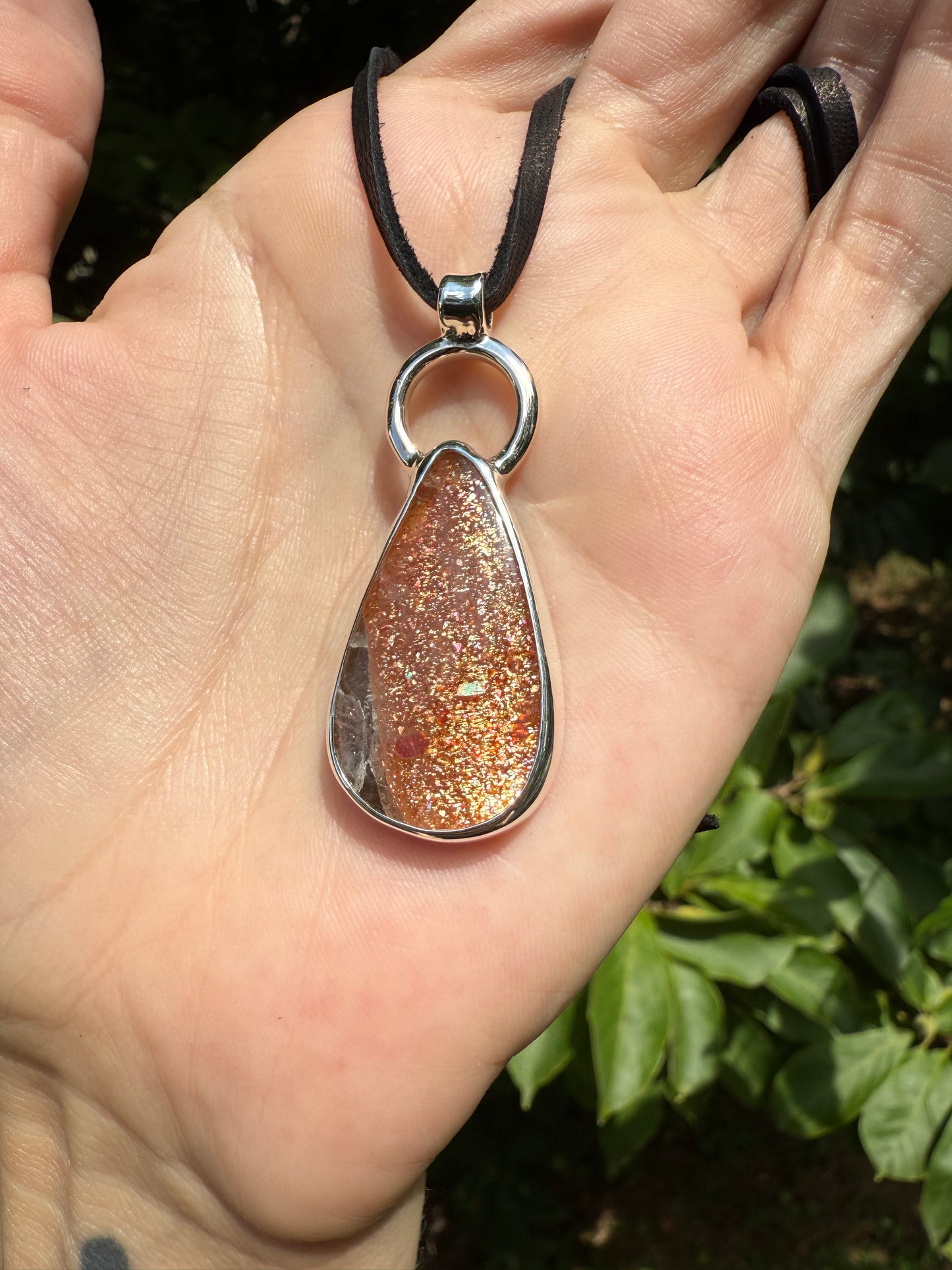 Confetti sunstone and silver pendant